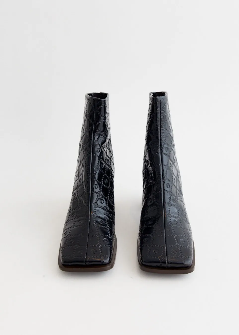 Moonogram Embossed Leather Block Boots