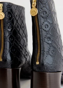 Moonogram Embossed Leather Block Boots