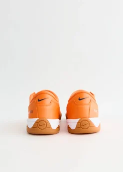 Total 90 'Safety Orange' Sneakers