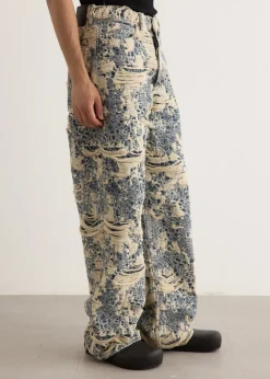 1981U Distressed Monogram Denim Jeans